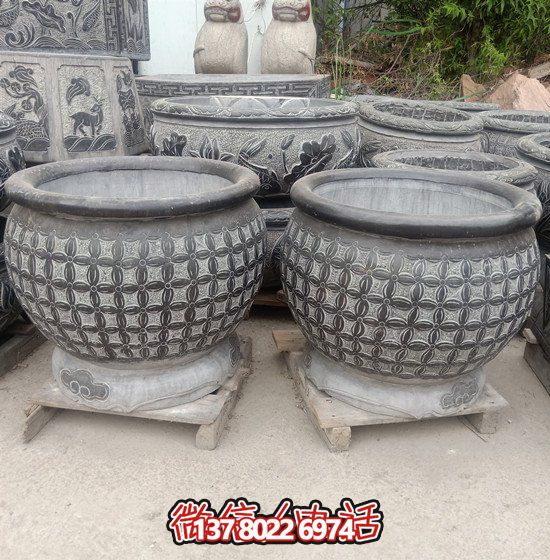 自然美學(xué)結(jié)合青石石雕、浮雕、編織、雕塑的戶外園林魚缸
